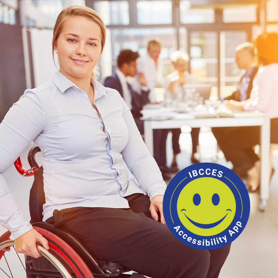 A woman in a wheelchair in an office setting